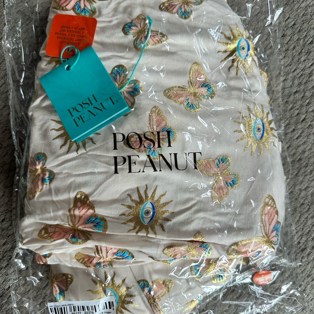 BNWT Posh Peanut Cream Fabric with Butterfly and Eye Design